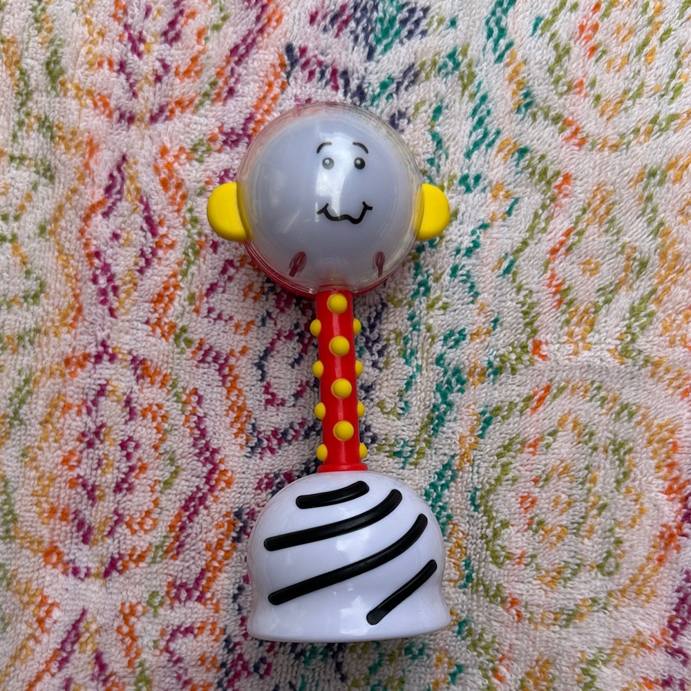 Smiling Face Baby Rattle with Red and Yellow Accents